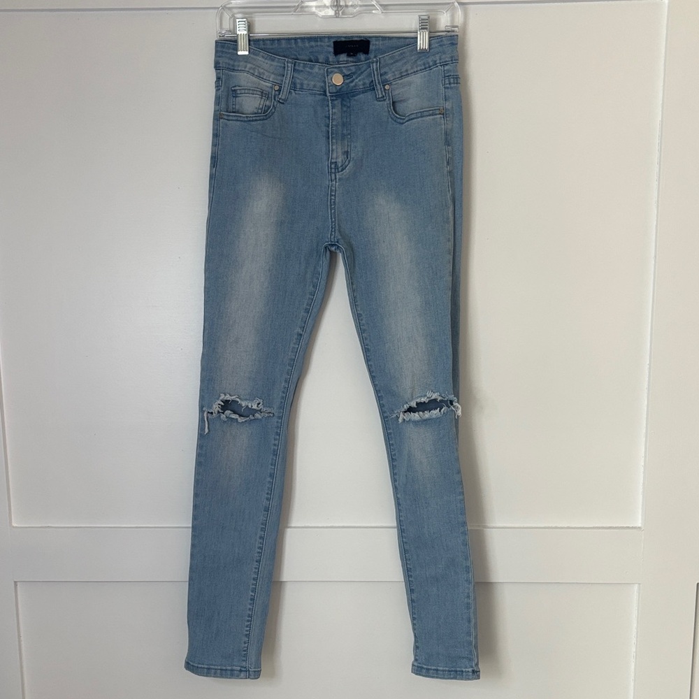 Women's Blue Distressed Jeans size medium by Julie